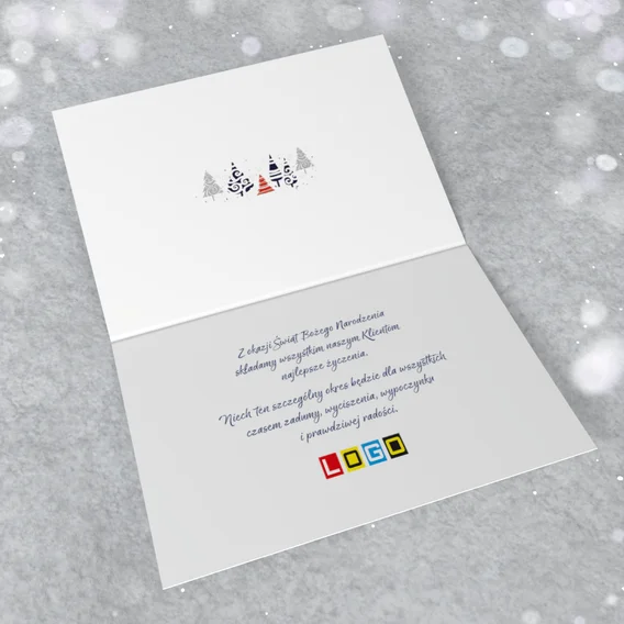 Otwarty karnet ze stroną wewnętrzną gotową na życzenia oraz logo firmy