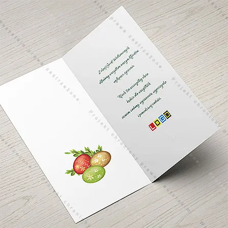 Jaja z liśćmi po lewej stronie wnętrza, po prawej tekst życzeń i miejsce na logo
